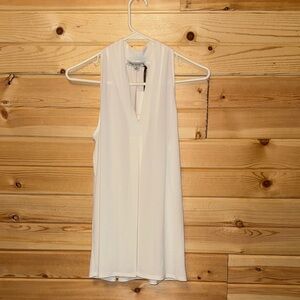 Green Envelope White Sleeveless Blouse